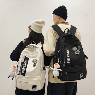 书包女大学生大容量男初中生高中生背包旅行新款 黑色双肩包设计感